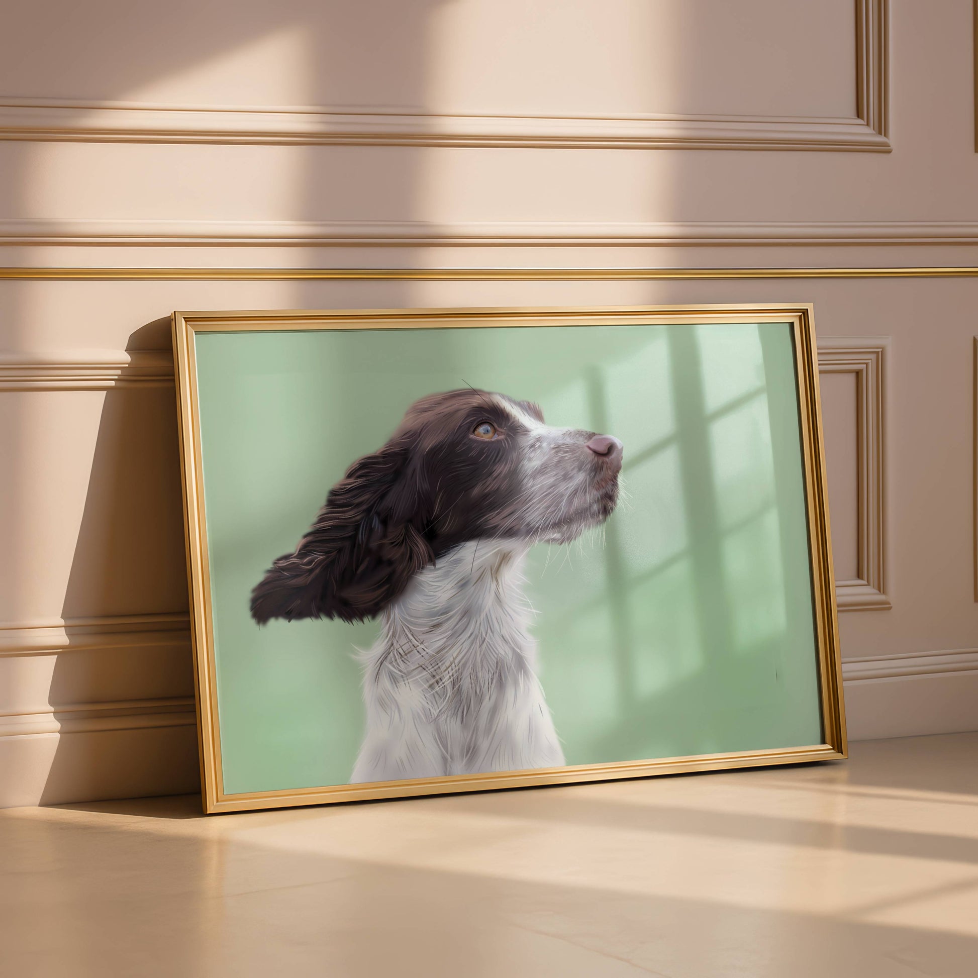 Framed picture of a springer spaniel on a wall with a gold frame